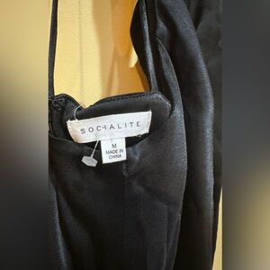 Black satin halter dress size medium socialite brand short dress